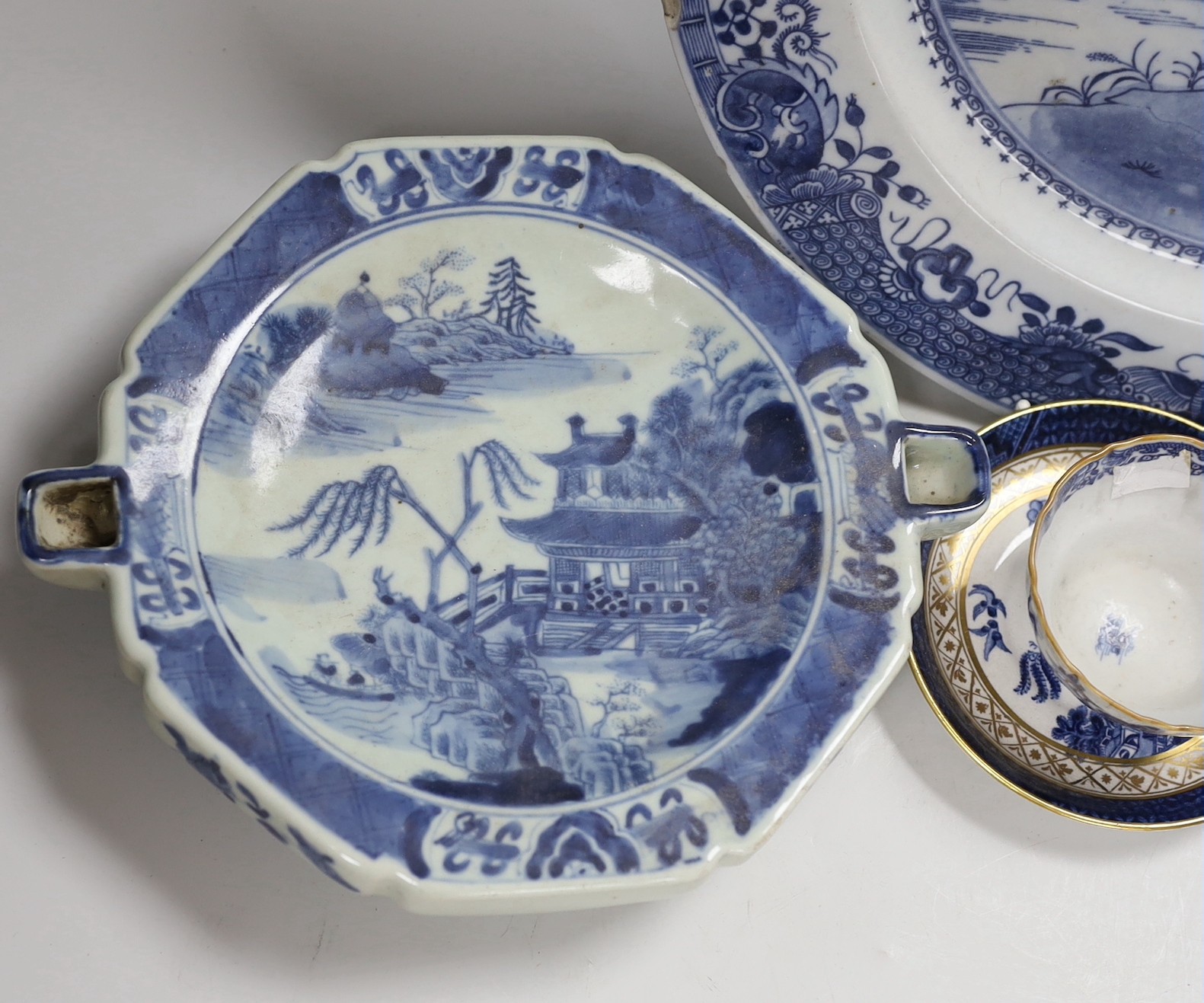 A group of English and Chinese blue and white tea and coffee wares, and a hot water dish, Chinese charger 35cms diameter